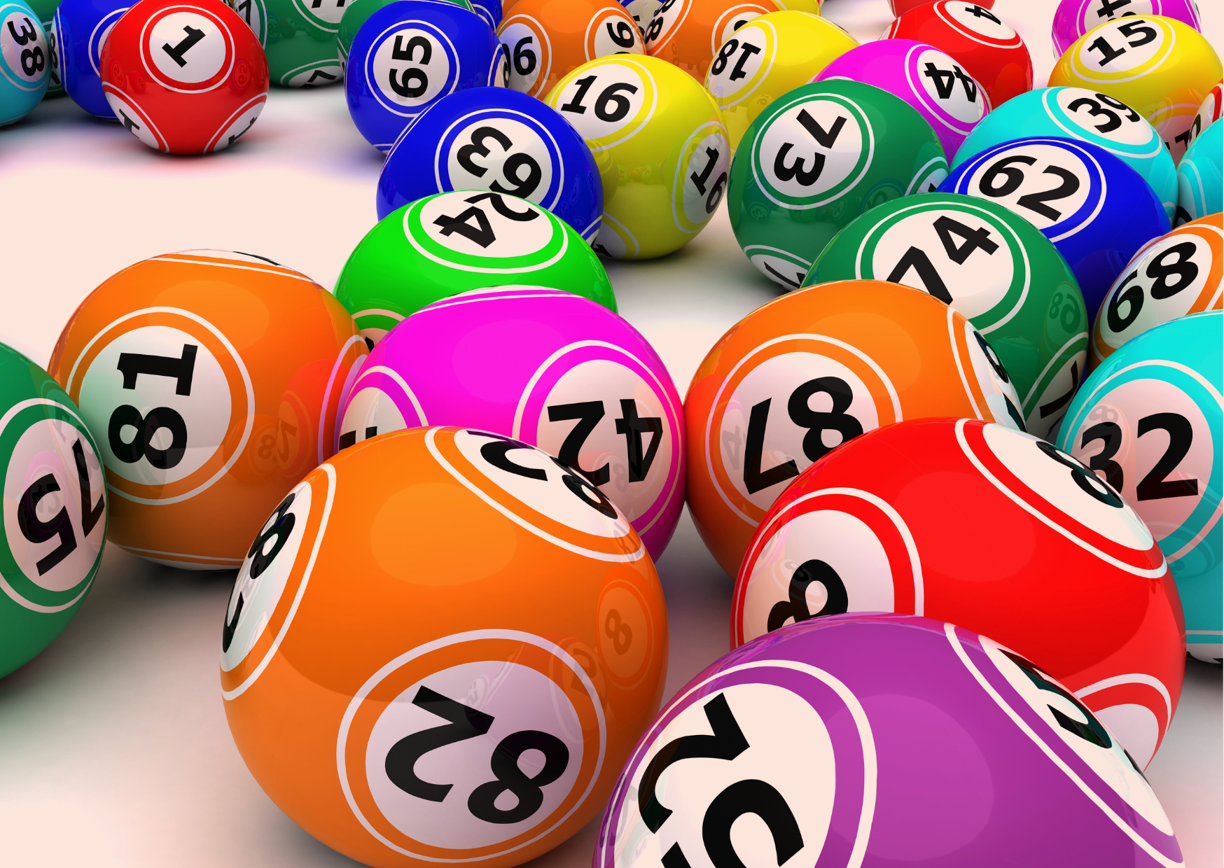 Image of several, generic colourful bingo balls on a table